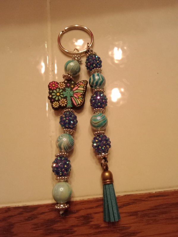 Beaded butterfly keychain with a tassel