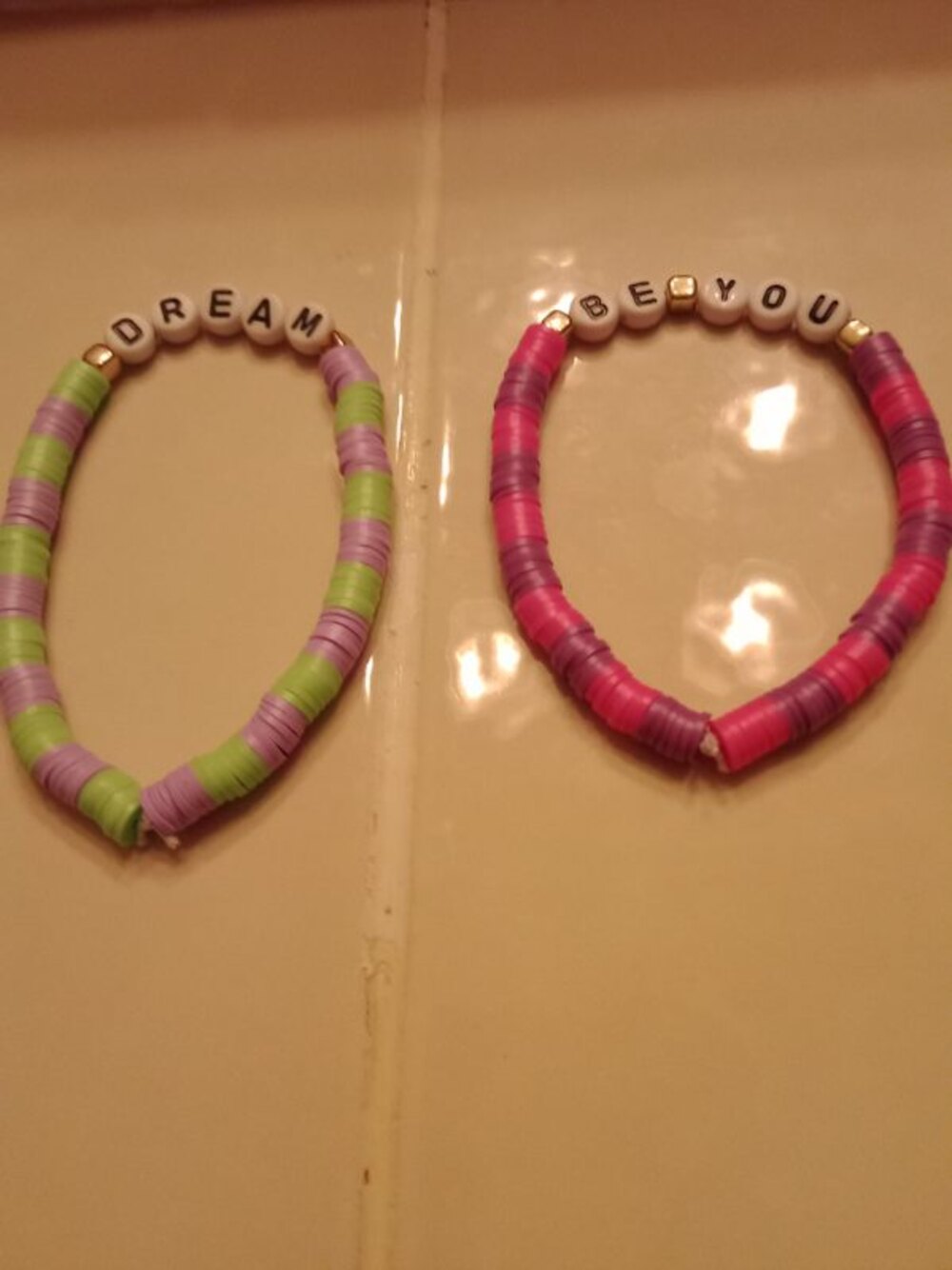 Pink and rainbow handmade beaded bracelets